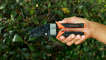 Load image into Gallery viewer, PA1140 held in front of bushes WEB
